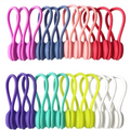 Set of colorful plastic hooks in various colors on a white background